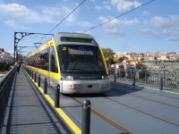Metro on Ponte Dom Luis I Bridge