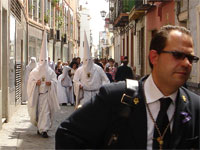 People in White Costume for Semana Santa